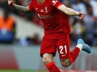 Liverpool's Kostas Tsimikas celebrates after scoring the goal in the penalty shoot out during FA Cup Final between Chelsea and Liverpool at...