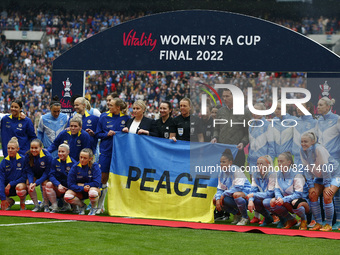 Players of both teams and match officials posing with Ukrainian flag before theWomen's FA Cup Final between Chelsea Women and Manchester Cit...