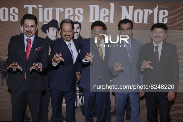(L-R) Luis Hernández, Hernán Hernández, Jorge Hernández, Raúl Hernández, Óscar Lara integrants of the Tigres del Norte band pose for photos...