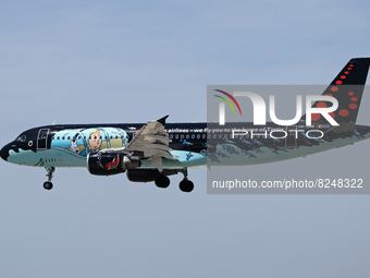 Airbus A320-214, from Brussels Airlines (Tintin comics Livery) company, landing at the Barcelona airport, in Barcelona on 12th May 2022. 
 -...