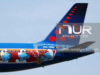 Airbus A320-214, from Brussels Airlines (The Smurfs Livery) company, landing at the Barcelona airport, in Barcelona on 18th May 2022. 
 -- (
