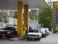 Ukrainian drivers stay in line to a petrol station trying to buy fuel in Odesa, Ukraine 18 May 2022. Private public transport companies of O...