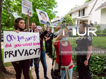 Pro-choice protesters walk past police and federal marshals standing in front of Justice Brett Kavanaugh’s house in Chevy Chase, MD.  Demons...