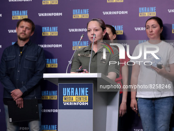 KYIV, UKRAINE - MAY 14, 2022 - Officer with the Ukrainian Marines Hanna Ivleieva, the wife of a Mariupol defender, delivers a speech during...