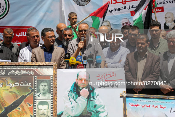 Palestinians take part in a rally demanding Israel to return the bodies of Palestinians who were killed by the Israeli army and detained aft...