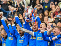 The Rangers team celebrate with the trophy after the Scottish Cup, Final football match between Rangers and Heart of Midlothian on May 21, 2...