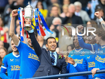 Rangers manager, Giovanni van Bronckhorst celebrates with the trophy after the Scottish Cup, Final football match between Rangers and Heart...