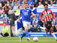 
Harvey Barnes of Leicester City passes the ball forward during the Premier League match between Leicester City and Southampton at the King...