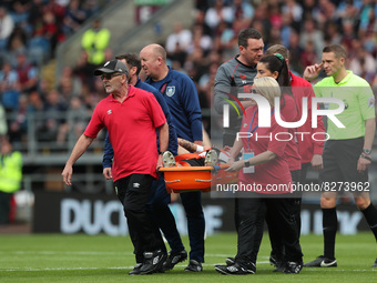 BURNLEY, UK. MAY 22ND Newcastle United's Joelinton is carried off on a stretcher  during the Premier League match between Burnley and Newcas...
