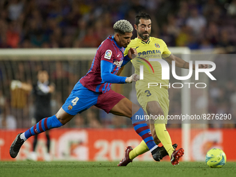 Ronald Araujo of Barcelona and Raul Albiol of Villarreal compete for the ball during the LaLiga Santander match between FC Barcelona and Vil...