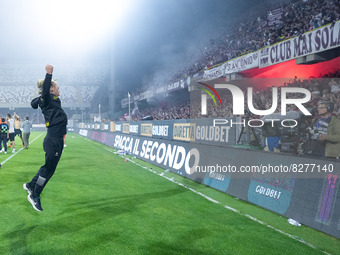 Davide Nicola manager of US Salernitana 1919 celebrates the salvation jumping in front of his supporters at the end of the Serie A  match be...