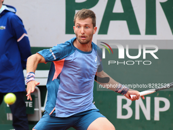 Corentin Moutet during his match against Stanislas Wawrinka on Suzanne Lenglen court in the 2022 French Open finals day two. (