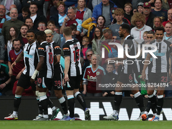 Newcastle United's Callum Wilson celebrates with his team mates after scoring from the penalty spot   during the Premier League match betwee...