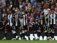 Newcastle United's Callum Wilson celebrates with his team mates after scoring from the penalty spot   during the Premier League match betwee...