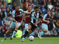 Jacob Murphy of Newcastle United in action with Burnley's Josh Brownhill during the Premier League match between Burnley and Newcastle Unit...