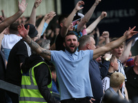 Newcastle United's fans celebrate after their second goal  during the Premier League match between Burnley and Newcastle United at Turf Moor...