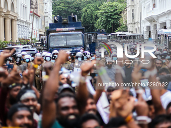 Protesters shout slogans in front of the police brigade during the protest near the president's house in Colombo, Sri Lanka, on May 24, 2022...