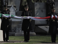 Elements of the Mexican army unroll the flag inside the Dolores Cemetery and the Rotunda of Illustrious Persons in Mexico City, prior to the...