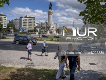 People are seen walking near the monument to the Marquis of Pombal. Lisbon, May 23, 2022. Portugal is the European Union country with the mo...