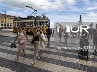 People are seen walking along one of the avenues near Praça de Comercio. Lisbon, May 23, 2022. Portugal is the European Union country with t...