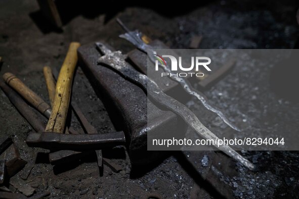 Javanese Keris dagger is seen at his workshop on May 20, 2022, in Sleman District, Yogyakarta, Indonesia. A keris is a double-edged asymmetr...