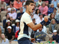 Carlos Alcaraz during his match against Albert Ramos-Vinolas on Simonne Mathieu court in the 2022 French Open finals day four (