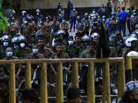 Sri Lankan military look on during a protest near the official residence of president Gotabaya Rajapaksa at  Colombo, Sri Lanka. 28 May 2022...