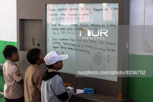 Students in a general class at a school in Tugu Utara Village, Regency Bogor, West Java province, Indonesia on 2 June, 2022. 
