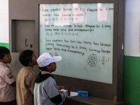 Students in a general class at a school in Tugu Utara Village, Regency Bogor, West Java province, Indonesia on 2 June, 2022. (