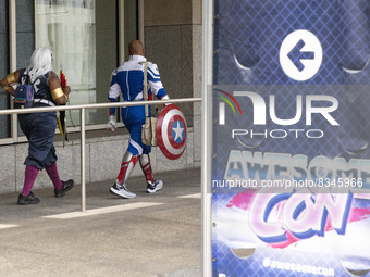 People in costume attend the 2022 Awesome Con comic convention at the Walter E. Washington Convention Center in Washington, D.C. on June 3,...