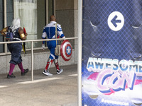 People in costume attend the 2022 Awesome Con comic convention at the Walter E. Washington Convention Center in Washington, D.C. on June 3,...