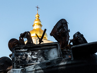 A burned tank is seen during an exhibition of destroyed Russian war vehicles exhibited at Michailovskyi Square in front of Saint Michail Mon...