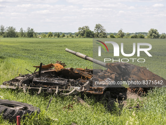 Russian military machinery destroyed during Russia's invasion of Ukraine lays on the agricultural field in Chernihiv area, Ukraine, June 202...