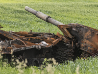 Russian military machinery destroyed during Russia's invasion of Ukraine lays on the agricultural field in Chernihiv area, Ukraine, June 202...