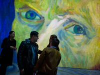 People take part in the immersive exhibition of Vincent Van Gogh's 'Beyond Van Gogh' experience that gathers his most important pieces of ar...