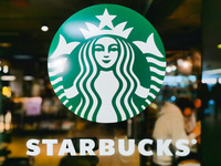 Starbucks logo is seen on a coffee shop at the railway station in Warsaw, Poland on June 2nd, 2022. (