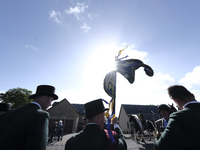 Hawick, UK. 10.Jun.2022.  
With the Bussed banner blue blowing in the wind, catching the suns rays from a blue sky above, supporters ride pa...