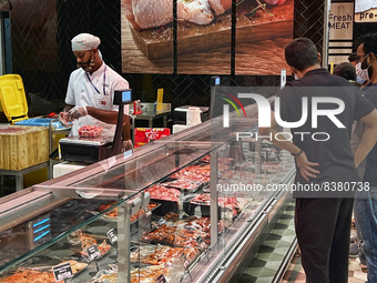 Shoppers purchase meat at the upscale LuLu Hypermarket located in the Lulu International Shopping Mall in Thiruvananthapuram (Trivandrum), K...