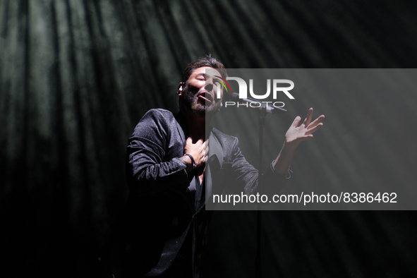 The singer Miguel Poveda during his concert, framed in 'Las Noches del Botánico', at the Real Jardín Botánico, on June 11, 2022, in Madrid (...