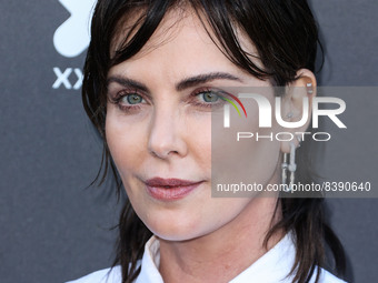 South African-American actress Charlize Theron arrives at the Charlize Theron Africa Outreach Project (CTAOP) 2022 Summer Block Party held a...