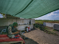 A ukrainian soldier in a checkpoint near the frontline of the Zaporizhzhia province, Ukraine. (