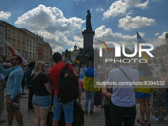 Members of the local Ukrainian diaspora, war refugees, peace activists, volunteers and local supporters during the 109th day of the 'Protest...