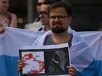Members of the local Russian diaspora in Krakow join the global anti-war demonstration of all free Russians and protest against the war with...