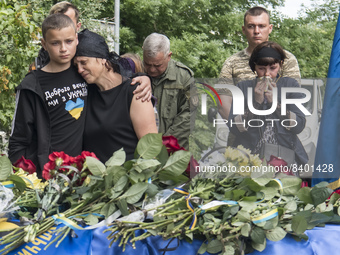 Relatives, friends and comrades attend the funeral ceremony for Ukrainian serviceman Mykhailo Tereshchenko, who was killed in the Donbas reg...