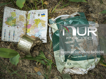 Remains of a food bag of the russian army and a map of Ukraine in the forests near Buda Babynetska village. Russian troops occupied large ex...