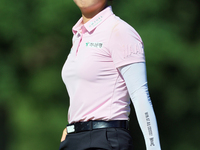 Minjee Lee of Perth, Australia walks off after putting on the 17th green during the first round of the Meijer LPGA Classic golf tournament a...