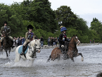 Selkirk, UK. 17.Jun.2022.  Selkirk Common Riding 2022. Friday.Riders, young and old,, ford the River Ettrick on the first crossing, headin...