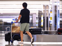A traveller in the arrival area of Changi Airport in SIngapore on Friday, 17 June 2022. (