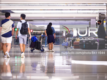 Travellers in the arrival area of Changi Airport in SIngapore on Friday, 17 June 2022. (