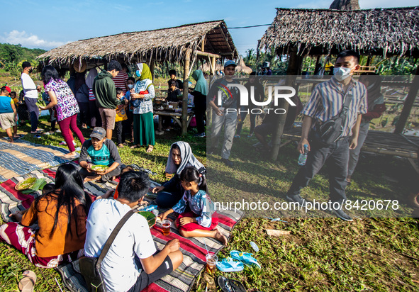 Tourists visit the Sawahan Market, a traditional snack market in Kalongan Village, Ungaran, Central Java, Indonesia on June 19, 2022. 